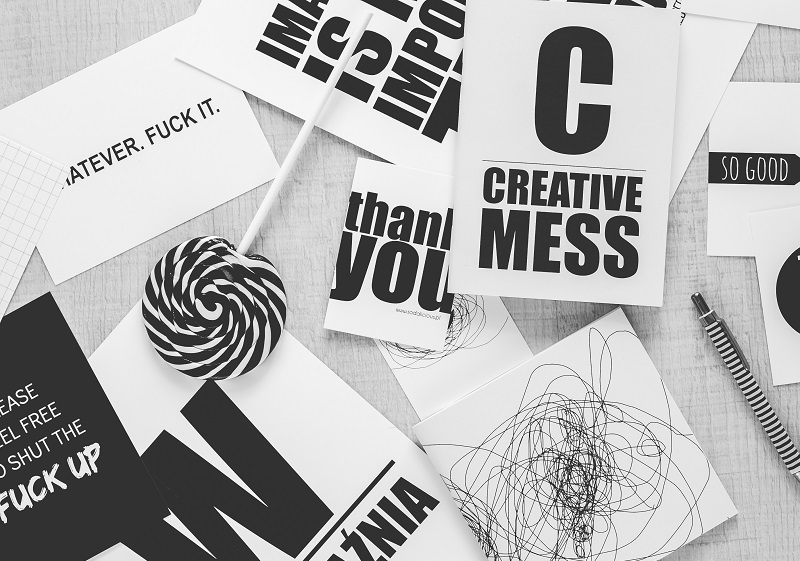 A bunch of stickers that are on the ground